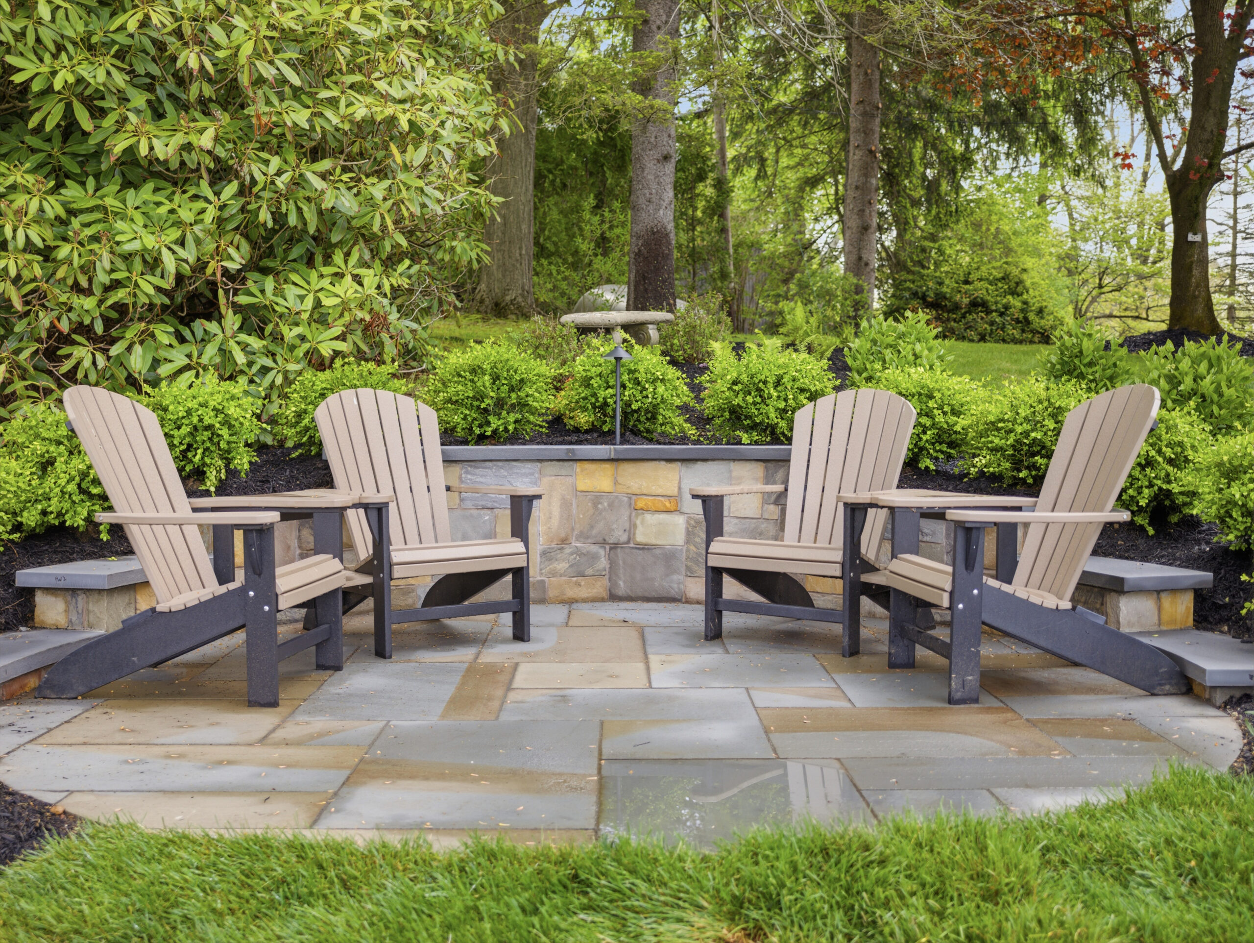 Flagstone fire pit seating area
